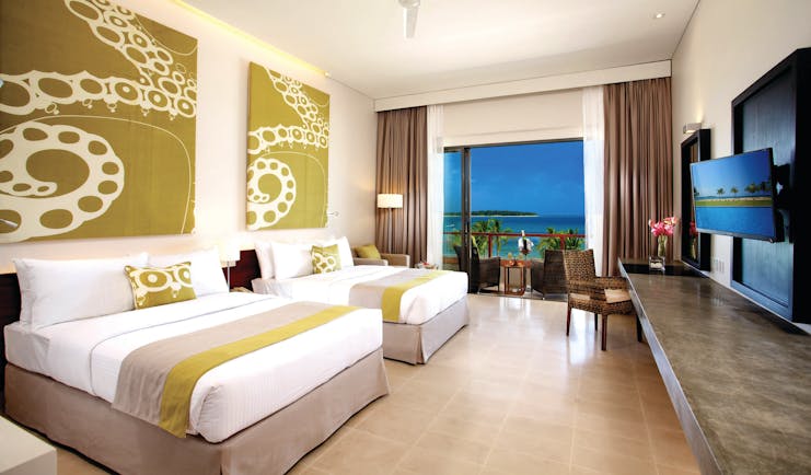 Amaya Beach Resort Sri Lanka deluxe room beds modern art modern décor private terrace ocean views