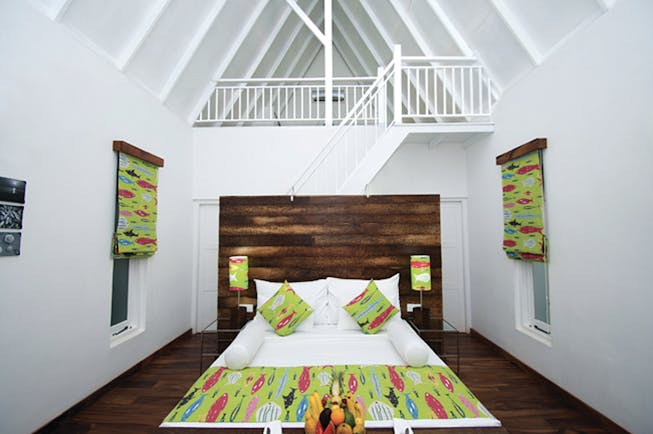 Maalu Maalu Sri Lanka deluxe attic room bed stairs leading to upper level bright modern décor
