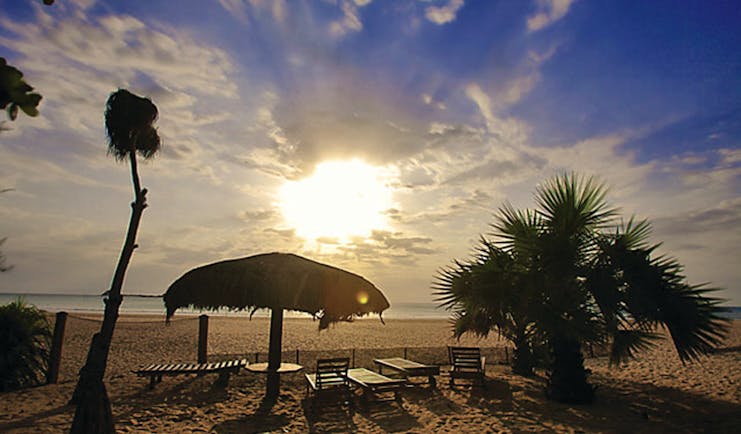 Nilaveli Beach Hotel Sri Lanka beach sand sea sun loungers palm trees