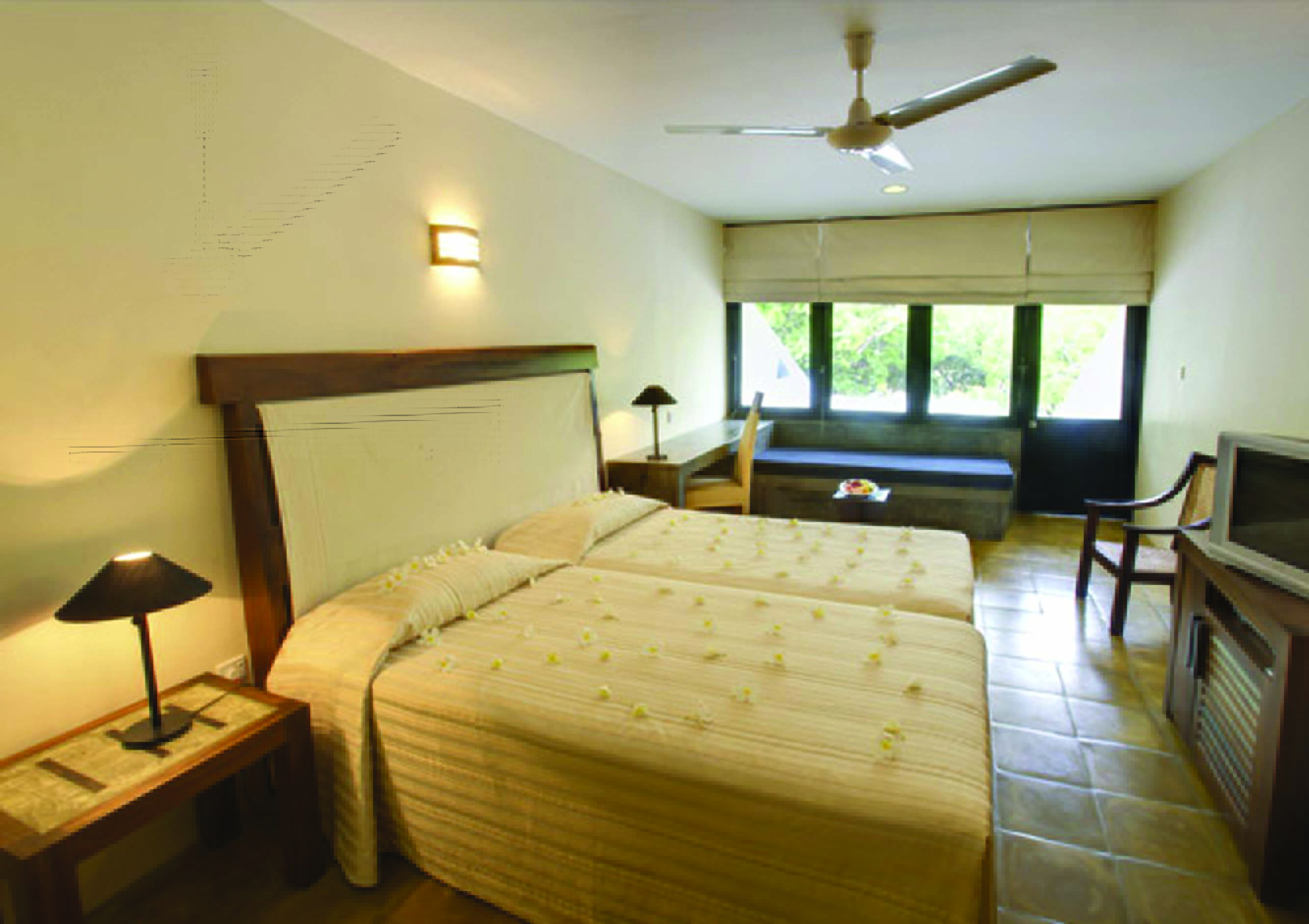 Nilaveli Beach Hotel Sri Lanka bedroom bed bench rustic décor