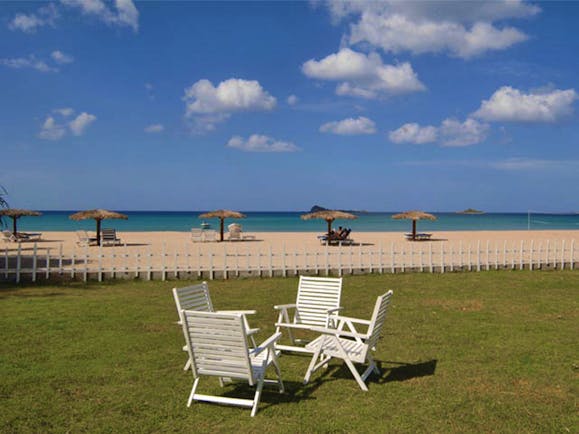 Pigeon Island Resort Sri Lanka beach deck chairs lawn sandy beach loungers umbrellas