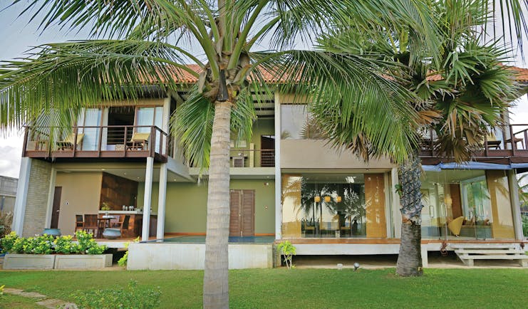 Uga Bay Sri Lanka beach villa exterior lawn palm trees private balcony