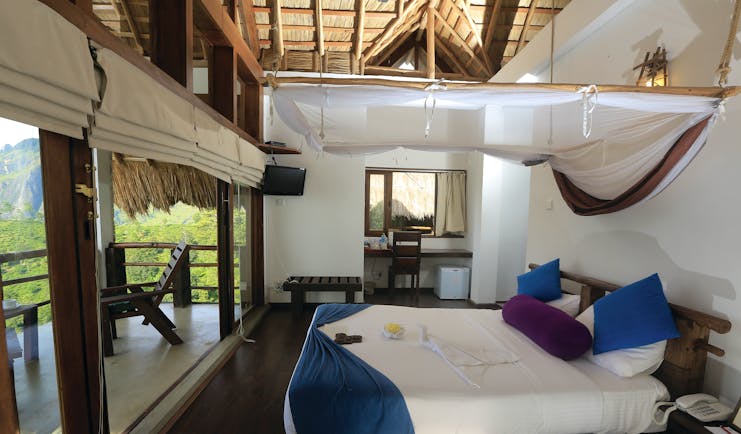 98 Acres Resort Sri Lanka standard room bed canopy modern décor access to private terrace