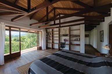 Bougainvillea Retreat Sri Lanka guestroom bed elegant décor access to private balcony