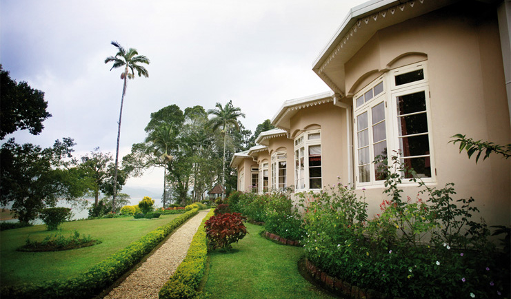 Ceylon Tea Trail Sri Lanka Castlereagh garden path through garden and bungalow front