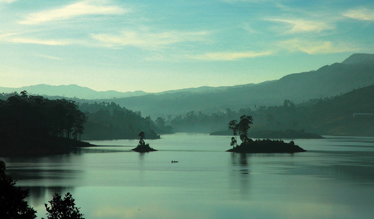 Ceylon Tea Trail Sri Lanka lake with small islands and mountain view