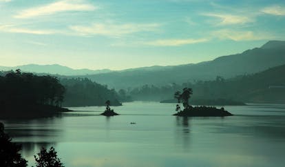 Ceylon Tea Trail Sri Lanka lake with small islands and mountain view