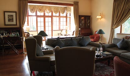 Ceylon Tea Trail Sri Lanka lounge bar bay windows sofa armchairs drinks cabinets