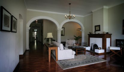 Ceylon Tea Trail Sri Lanka lounge with sofas and fireplace