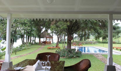 Ceylon Tea Trail Sri Lanka outdoor pool loungers garden and lake view