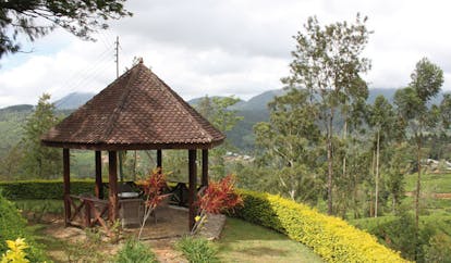 Ceylon Tea Trail Sri Lanka pagoda views ourtood seating area mountain view