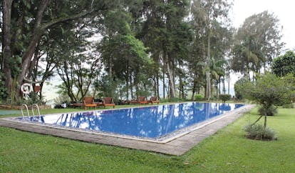 Ceylon Tea Trail Sri Lanka outdoor swimming pool and grassy surrouound