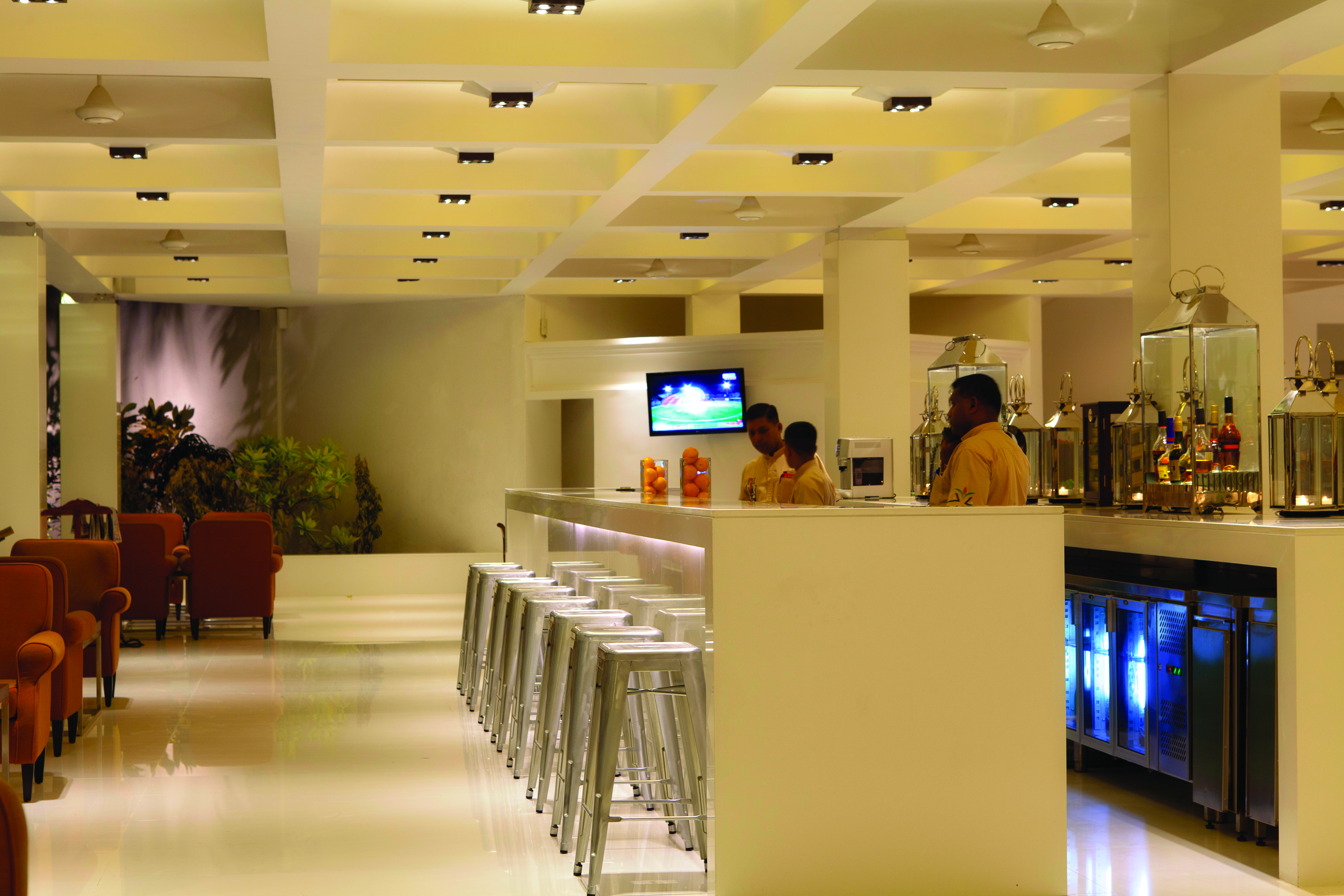 Cinnamon Citadel Sri Lanka bar seating area bar stools bar tenders