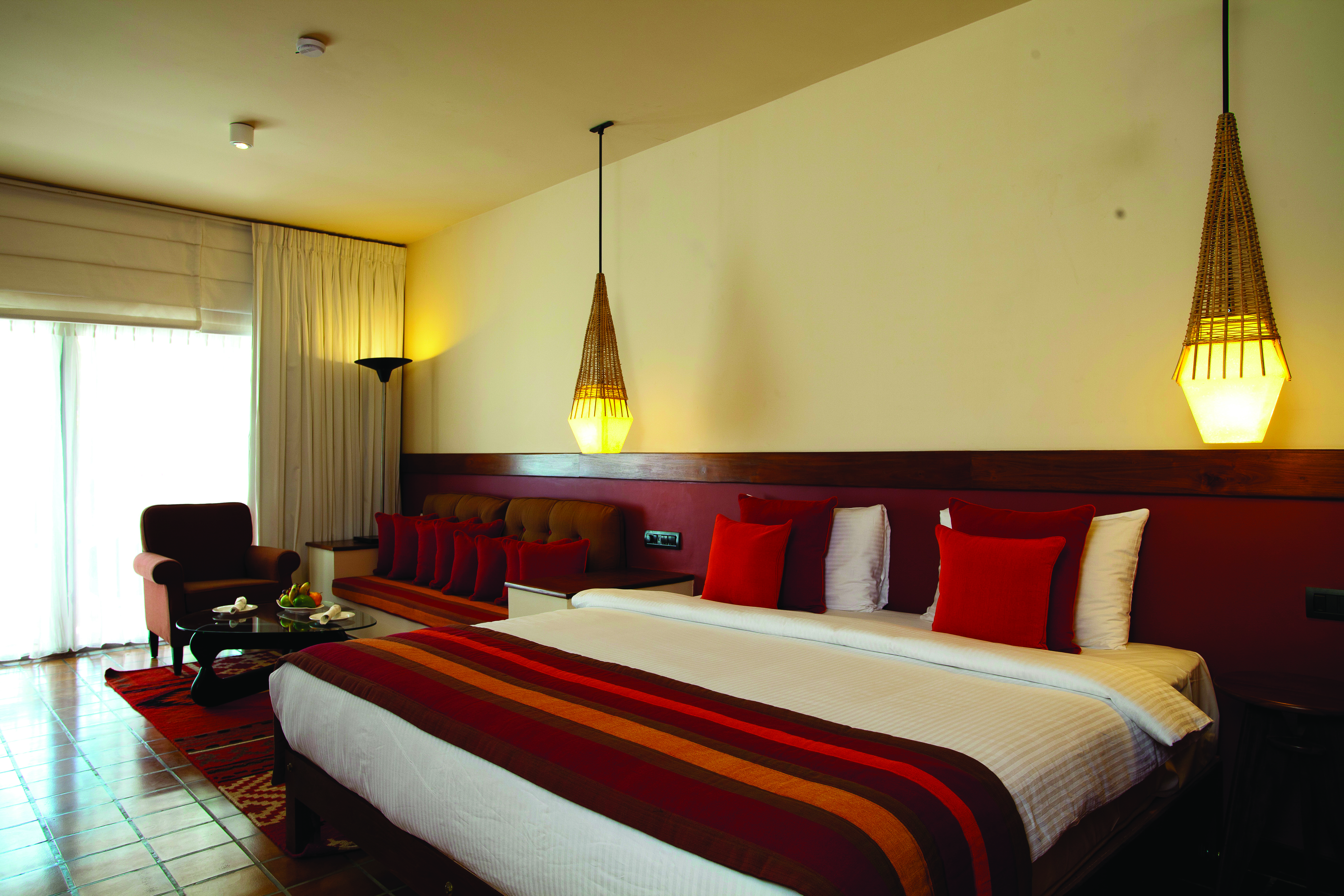 Cinnamon Citadel Sri Lanka deluxe room bed sofa lighting modern décor