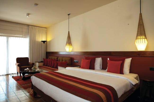 Cinnamon Citadel Sri Lanka deluxe room bed sofa lighting modern décor