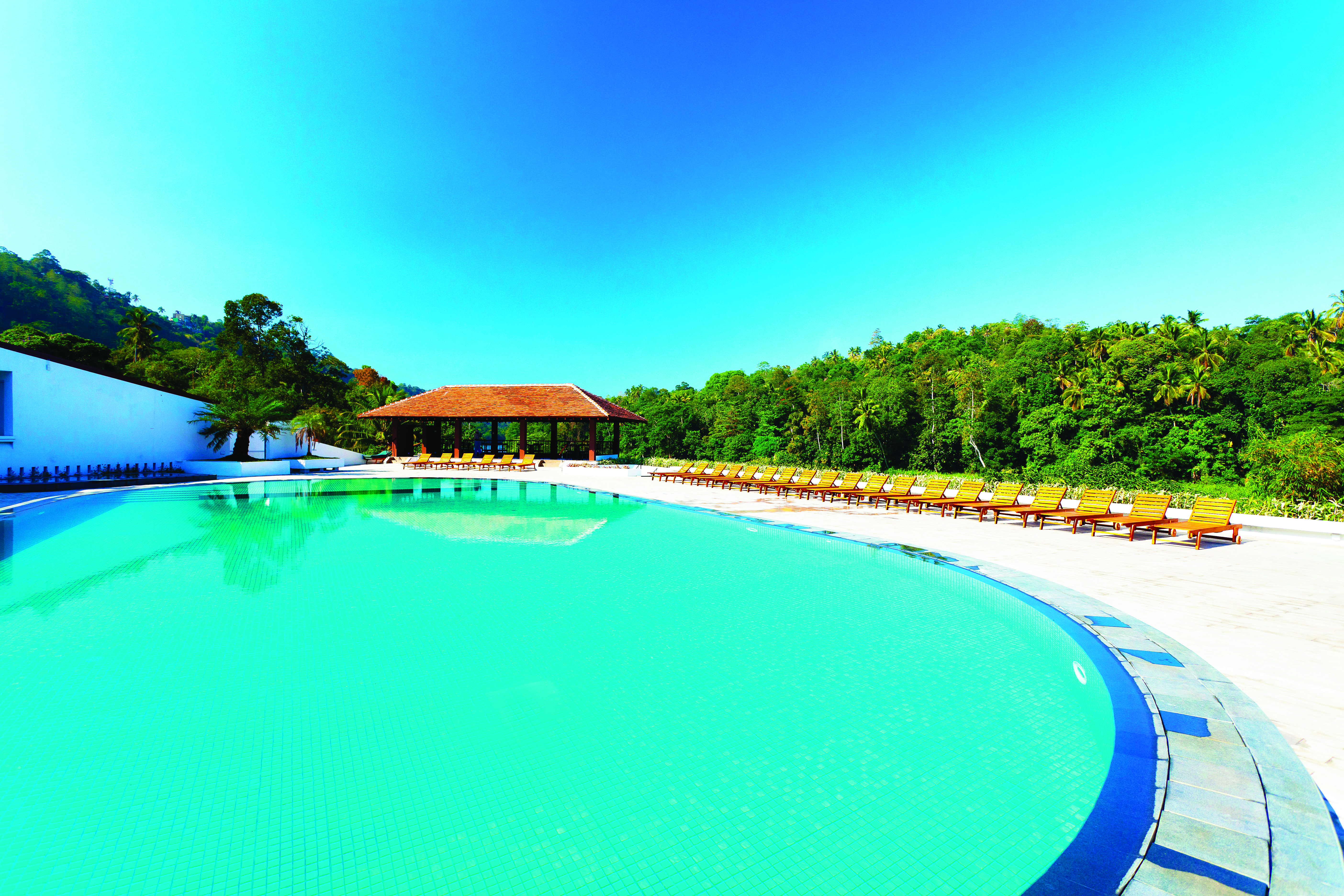 Cinnamon Citadel Sri Lanka pool sun loungers countryside surroundings