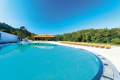 Cinnamon Citadel Sri Lanka pool sun loungers countryside surroundings