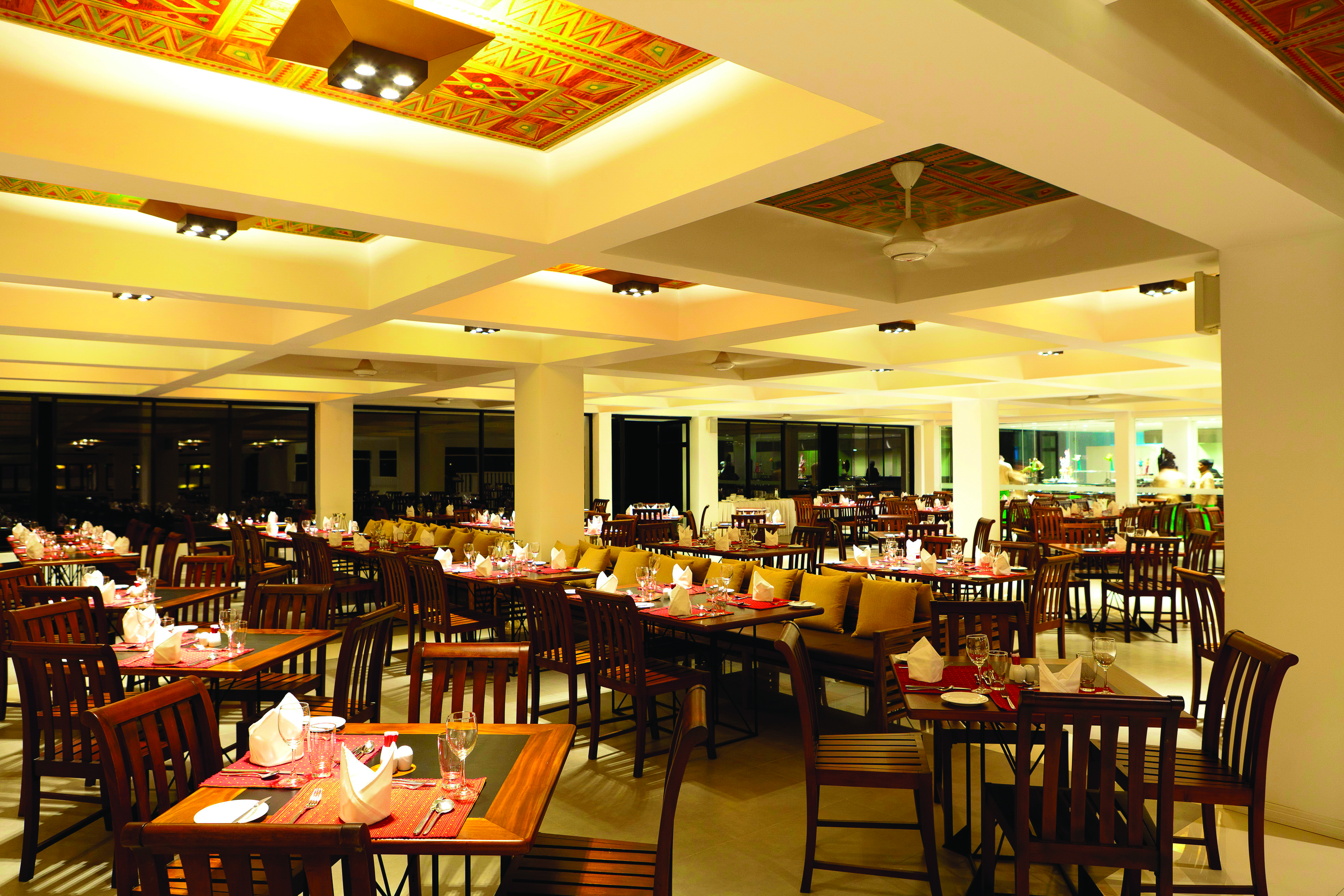 Cinnamon Citadel Sri Lanka restaurant indoor dining area tables chairs bright modern décor