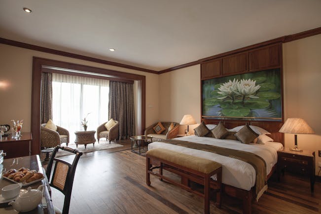 Earl's Regency Sri Lanka luxury room bed seating area large painting modern décor