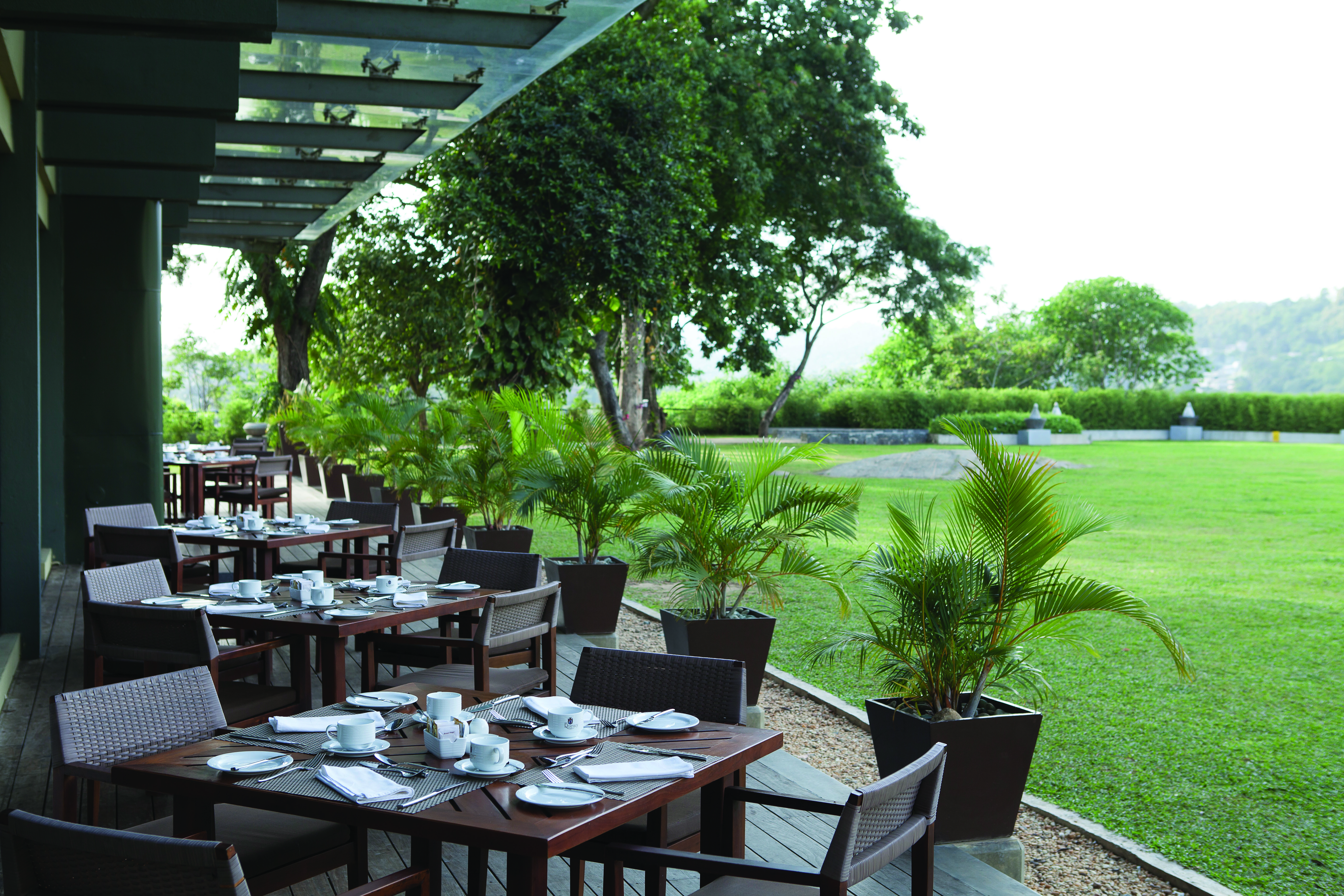 Earl's Regency Sri Lanka restaurant terrace outdoor dining area overlooking lawns