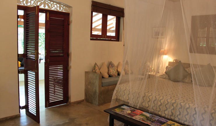 Ellerton Sri Lanka bedroom mosquito drapes sofa balcony access