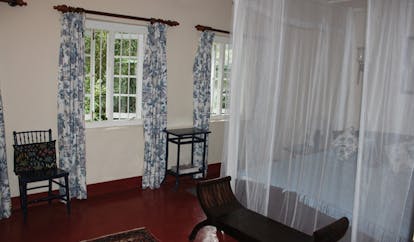 Ellerton Sri Lanka blue bedroom four poster bed mosquito drapes 