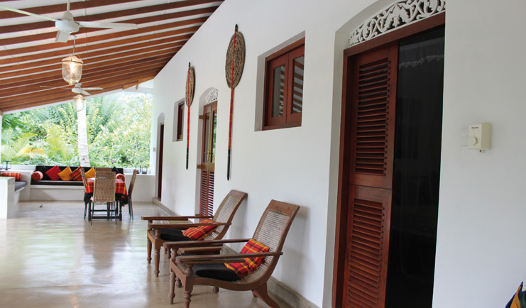 Ellerton Sri Lanka covered patio balcony trees loungers sofa