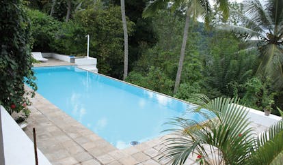 Ellerton Sri Lanka outdoor pool loungers forest view