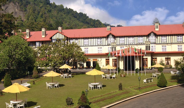 Grand Hotel Nuwara Eliya Sri Lanka exterior hotel building lawns hills in background