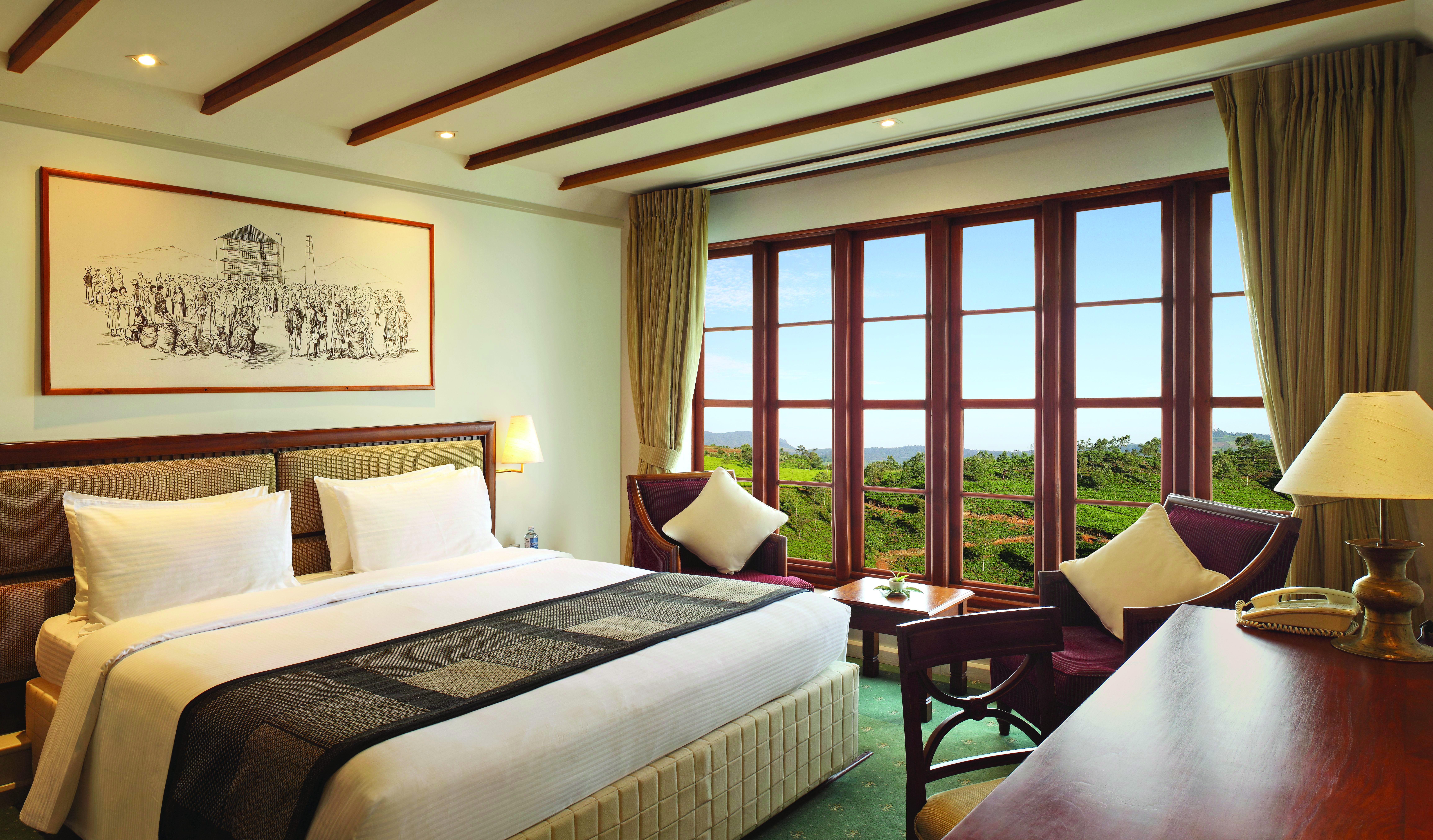 Heritance Tea Factory Sri Lanka executive deluxe room bed armchairs modern décor