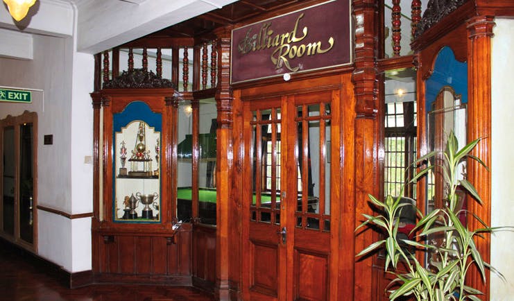 Hotel Suisse Sri Lanka billiard room trophy cabinet 