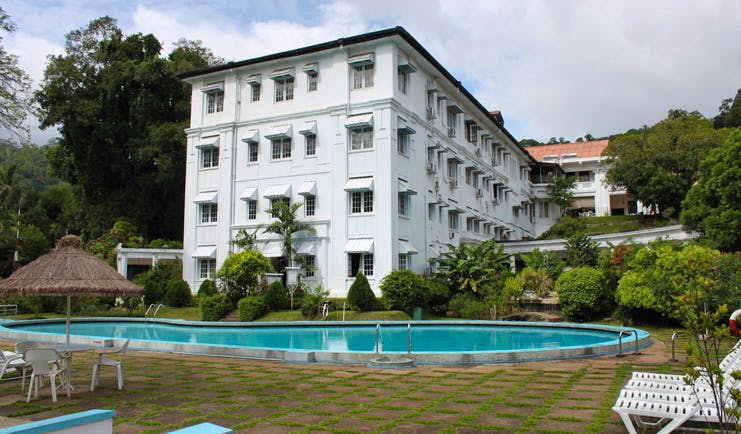 Hotel Suisse Sri Lanka outdoor pool loungers hotel view