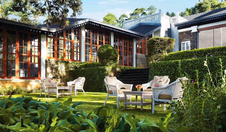 Dining terrace with seats set out in front of the hotel