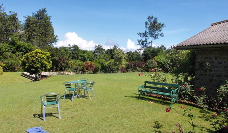 Kirchhayn Bungalow Sri Lanka garden lawns flowers benches and chairs 