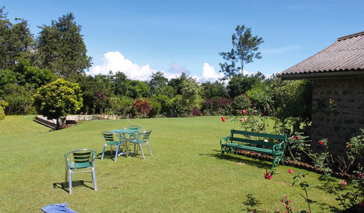 Kirchhayn Bungalow Sri Lanka garden lawns flowers benches and chairs