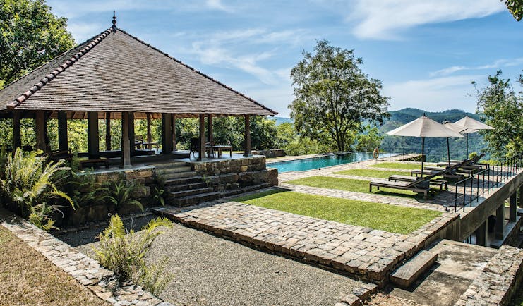 Living Heritage Sri Lanka pool side sun loungers lawns covered veranda countryside surrounds
