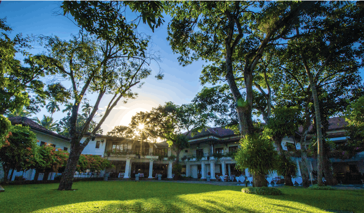 Mahaweli Reach Hotel gardens, trees, lawns, hotel buildings