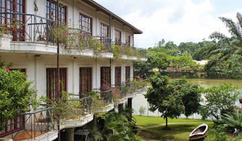 Mahaweli Reach Hotel Sri Lanka exterior hotel balconies river flowers