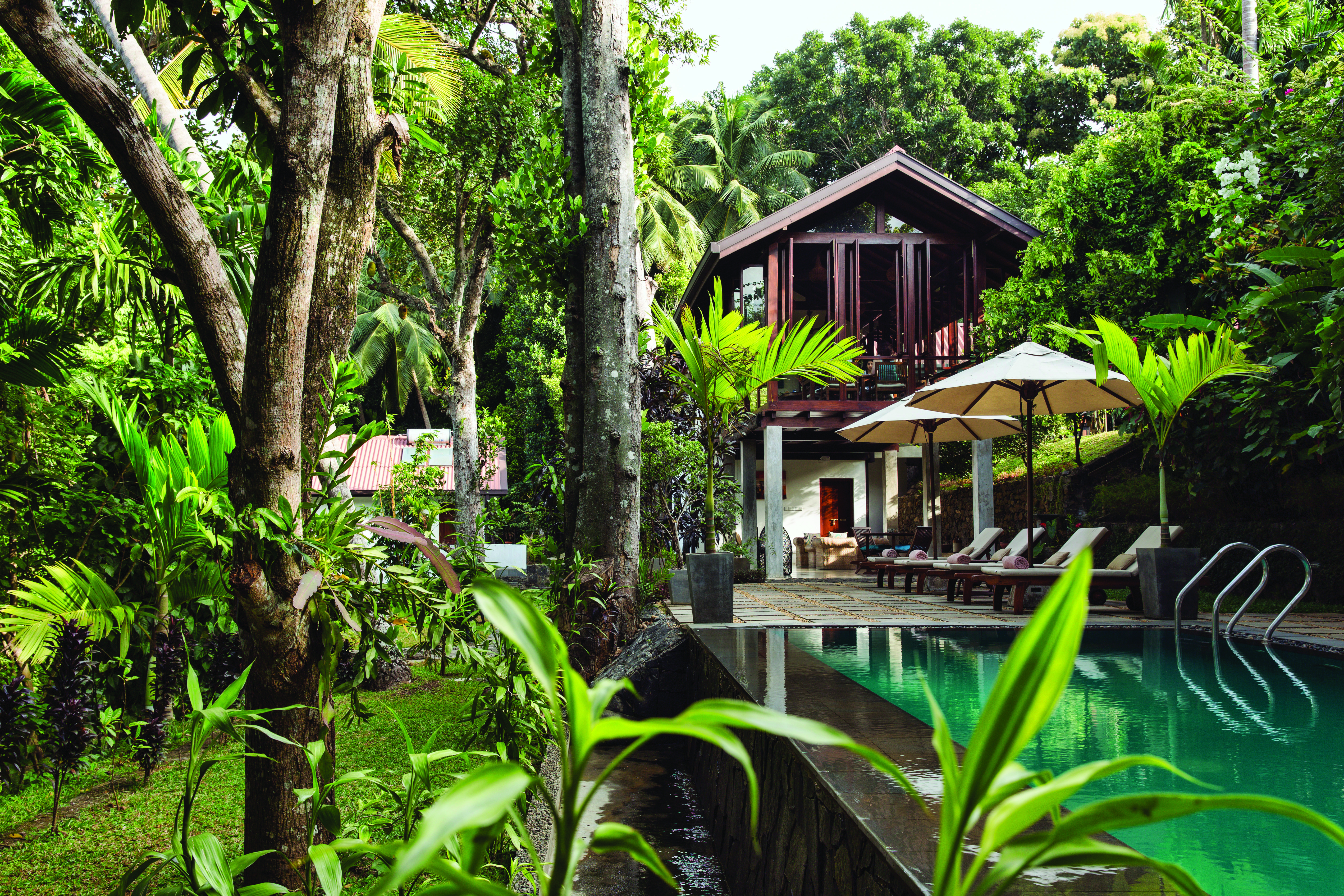 Rosyth Estate House Sri Lanka poolside terrace hotel building surrounded by trees