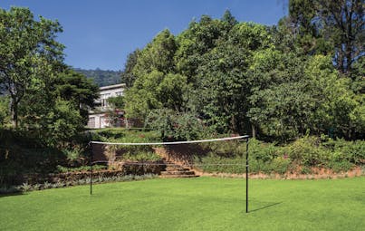 Taylor's Hill Sri Lanka gardens lawn trees shrubs badminton net
