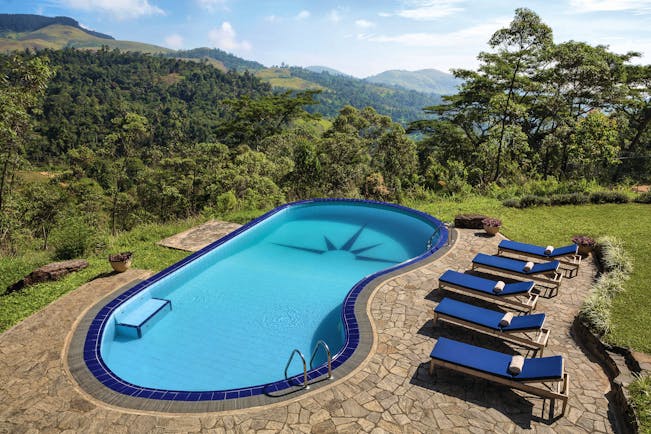 Taylor's Hill Sri Lanka pool terrace sun loungers countryside and mountains in background