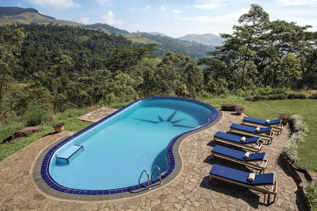 Taylor's Hill Sri Lanka pool terrace sun loungers countryside and mountains in background