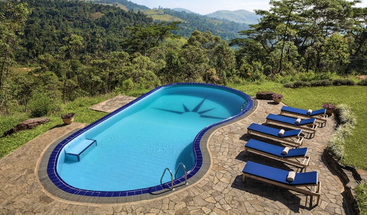 Taylor's Hill Sri Lanka pool terrace sun loungers countryside and mountains in background