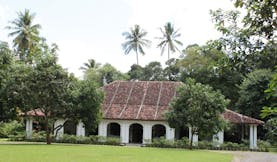 The Kandy House Sri Lanka exterior bungalow gardens and trees