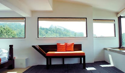 Theva Expressions Sri Lanka bedroom seating modern dark wood and orange sofa