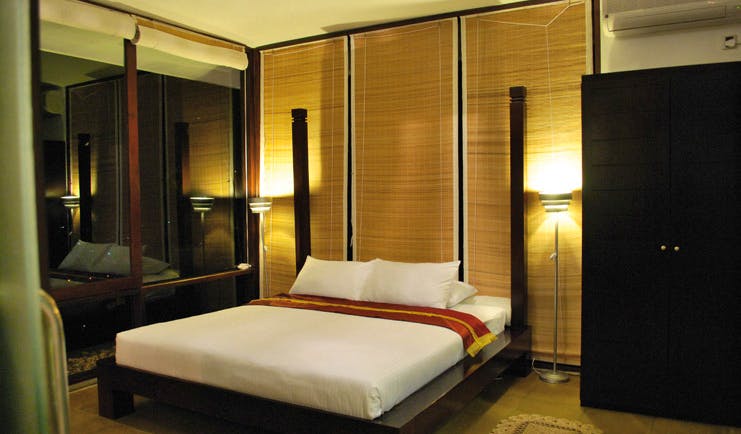 Theva Expressions Sri Lanka bedroom minimalist decor dark wood panoramic view
