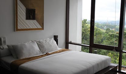 Theva Expressions Sri Lanka Hatara deluxe bedroom minimalist decor forest view