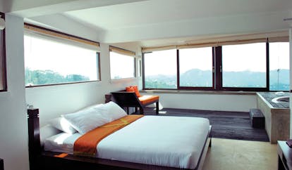 Theva Expressions Sri Lanka large bedroom minimalist decor wood sofa jacuzzi and panoramic views