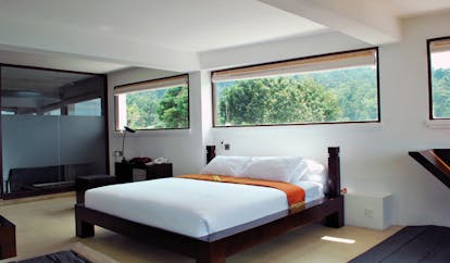 Theva Expressions Sri Lanka modern bedroom minamilst decor dark wood bed
