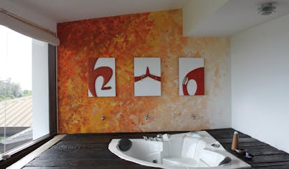Theva Expressions Sri Lanka orange suite painted wall modern artwork jacuzzi